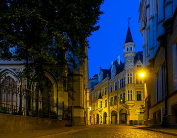 Illuminated historic building against sky at night