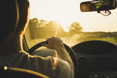 Man driving in the countryside