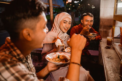 Close-up of girl eating food