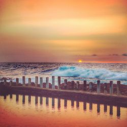 Scenic view of sea against sky during sunset