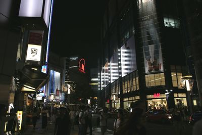 Crowd in city at night