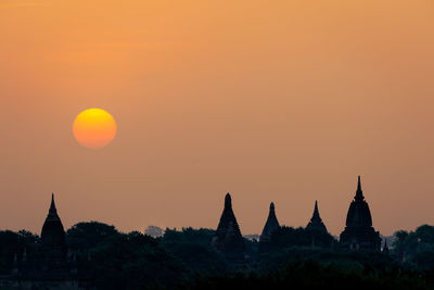 View of temple against sky during sunset