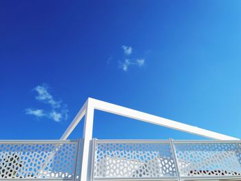 Low angle view of building against blue sky