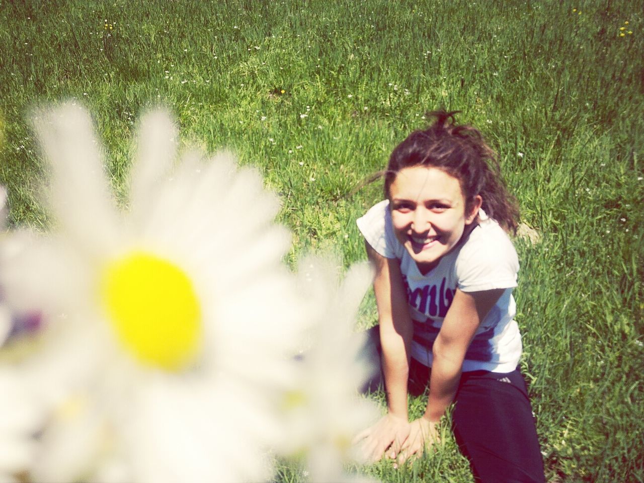 lifestyles, leisure activity, person, flower, elementary age, casual clothing, childhood, field, cute, girls, grass, innocence, portrait, standing, smiling, looking at camera, growth, happiness