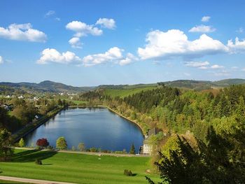 Scenic view of landscape against cloudy sky