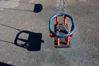 Old swing on the playground, childhood moments