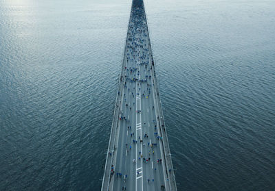 High angle view of sailboat sailing in sea