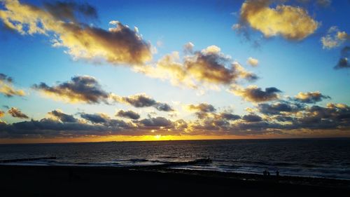 Scenic view of sea against sky at sunset