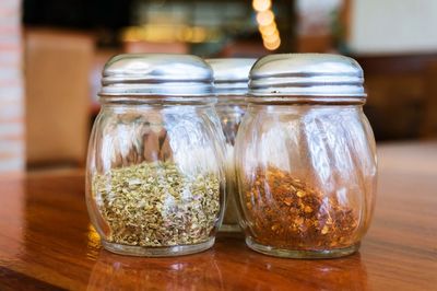 Close-up of spices in jar on table