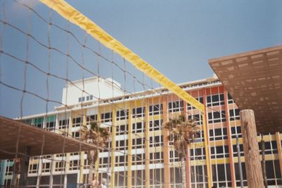 Low angle view of net against building