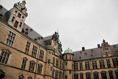 Low angle view of buildings against sky