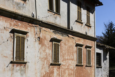 Low angle view of old building against sky