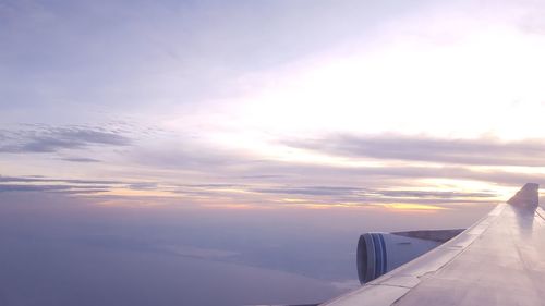 Scenic view of landscape against cloudy sky