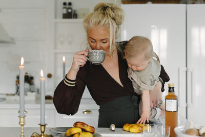 Mother with baby at home