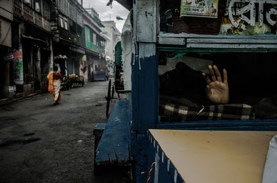 Man in front of building