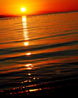 Scenic view of sea at sunset