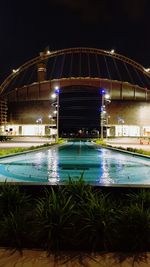 View of swimming pool at night