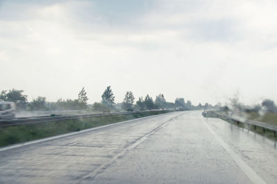 Surface level of road against sky