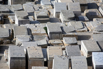 Tombstones in jewish cemetery on sunny day