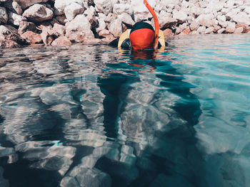 Man swimming in sea