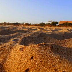 Surface level of land against clear sky