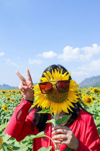 Low angle view of sunflower against sky