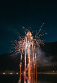 Firework display at night