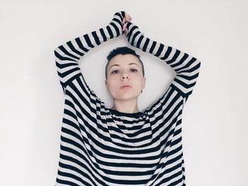 Portrait of boy against white background