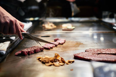 Close-up of person preparing food