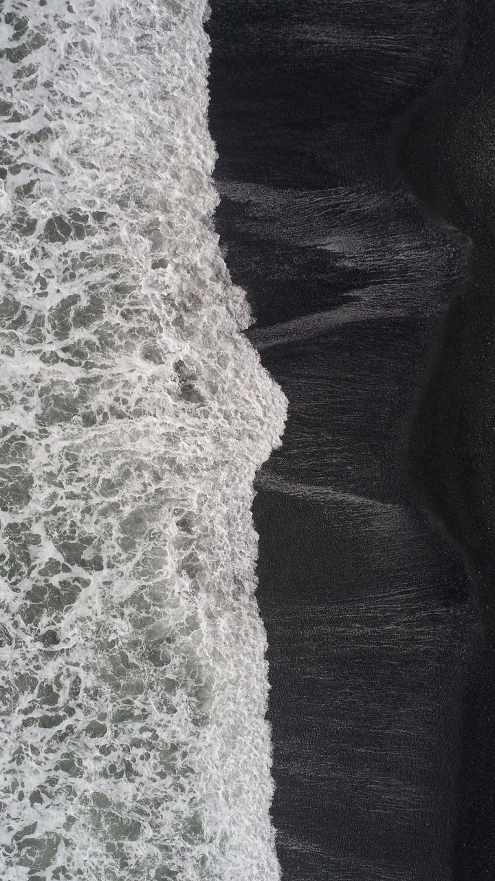 HIGH ANGLE VIEW OF SEA BY WALL