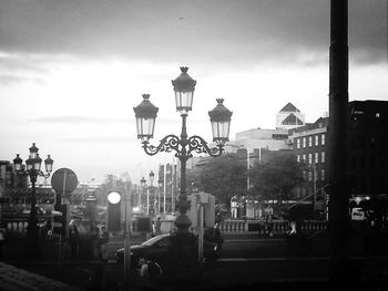 Street light against sky at dusk