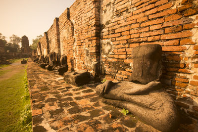 Old ruins against brick wall