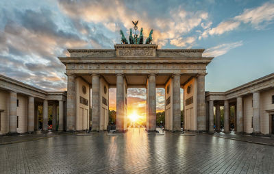 View of historic building at sunset