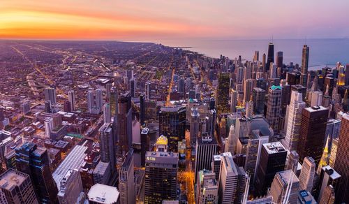 Aerial view of city at dusk