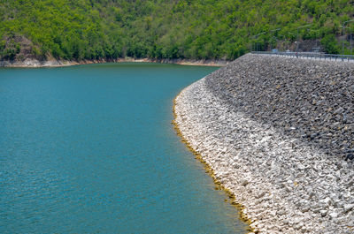 High angle view of lake amidst trees