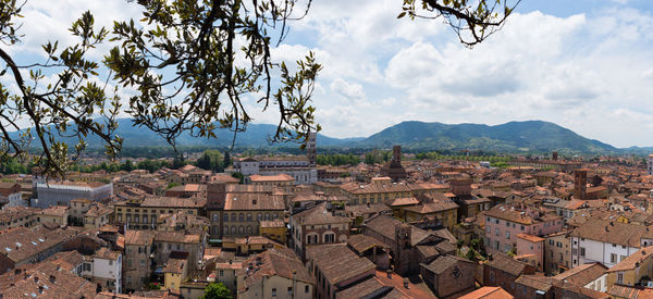 Aerial view of townscape against sky