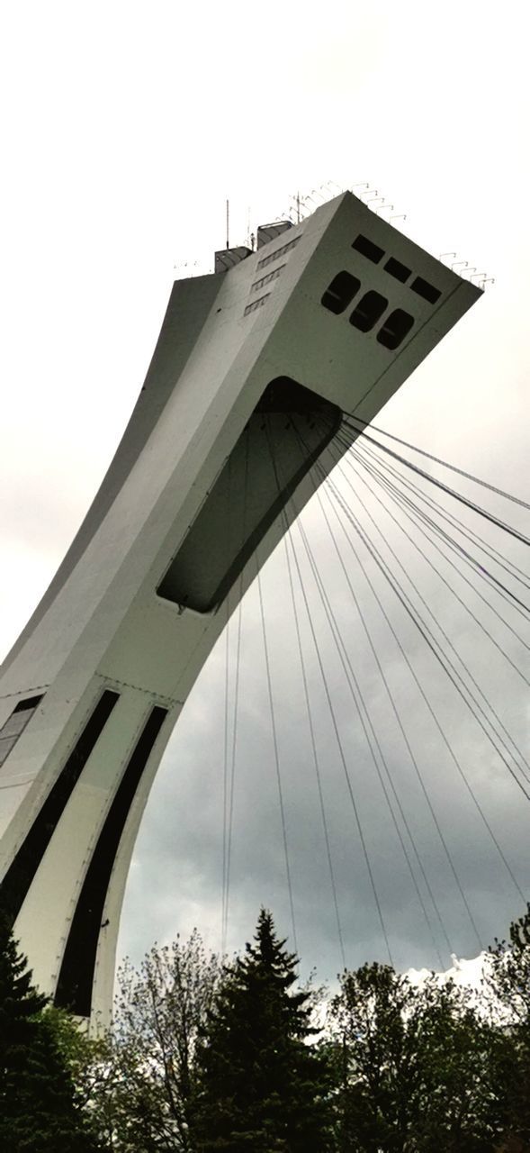 LOW ANGLE VIEW OF BRIDGE AGAINST CLOUDY SKY