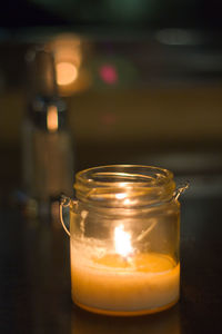 Close-up of candle on table