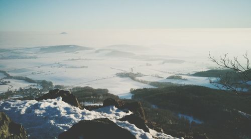 Scenic view of snow mountains against sky