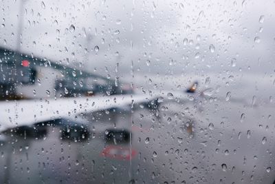 Full frame shot of wet glass window in rainy season