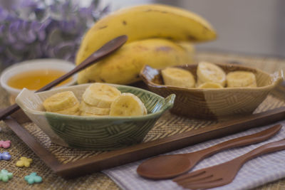 Close-up of banana sliced in bowls