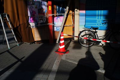 Bicycle standing on street in city