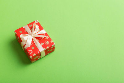 Close-up of gift box against pink background