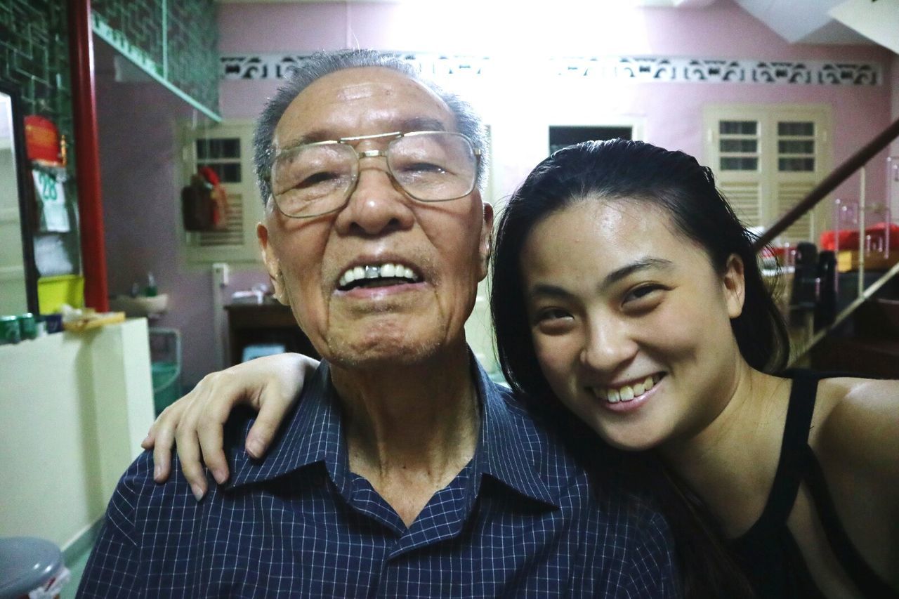 two people, lifestyles, looking at camera, togetherness, real people, portrait, happiness, leisure activity, headshot, smiling, architecture, standing, front view, young women, eyeglasses, bonding, senior adult, friendship, young adult, cheerful, adults only, people, adult, day, outdoors