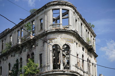 Low angle view of old building against sky