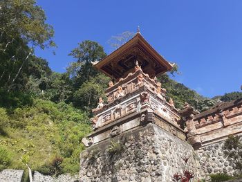 Low angle view of temple building against sky