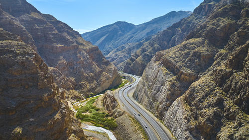 High angle view of road leading towards mountains