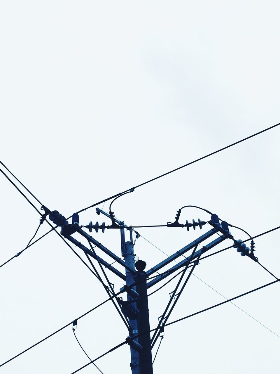 LOW ANGLE VIEW OF POWER LINES AGAINST SKY