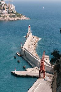 High angle view of buildings by sea