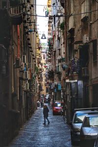 People walking on street in city